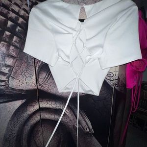 White boutique crop top. Tie up back. Tried on twice.